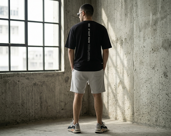 BLACK DROP SHOULDER JERSEY T-SHIRT WITH EMBOSS PRINT